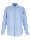 Chemise en lin bleue Polo Ralph Lauren, style décontracté, avec col et manches longues, portée décontractée.