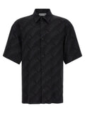 Blouse en viscose noire de Balenciaga, élégante avec coupe moderne et détails sophistiqués, vue de face.