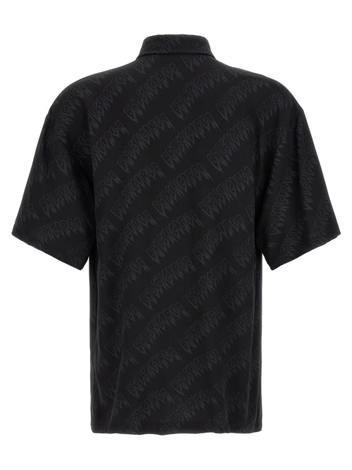 Chemise noire en viscose de Balenciaga avec col ample et manches longues, affichant un style élégant et moderne.