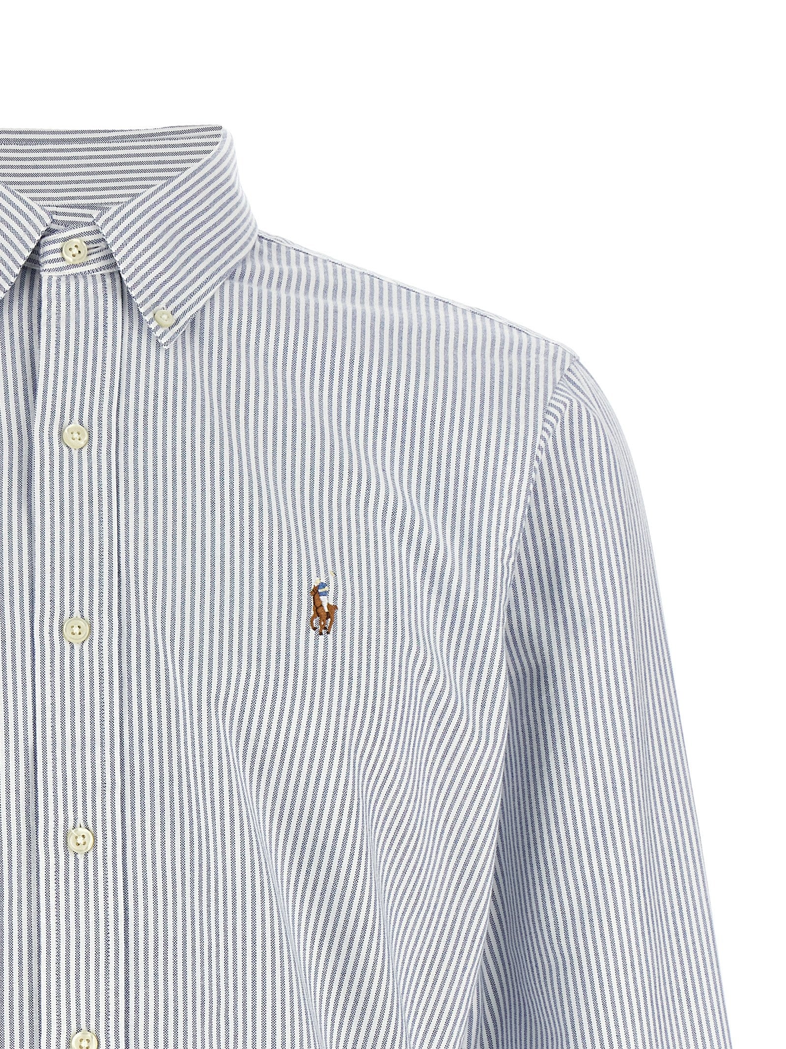 Chemise en coton bleu Polo Ralph Lauren, style polo classique avec col et boutons, vue de face.