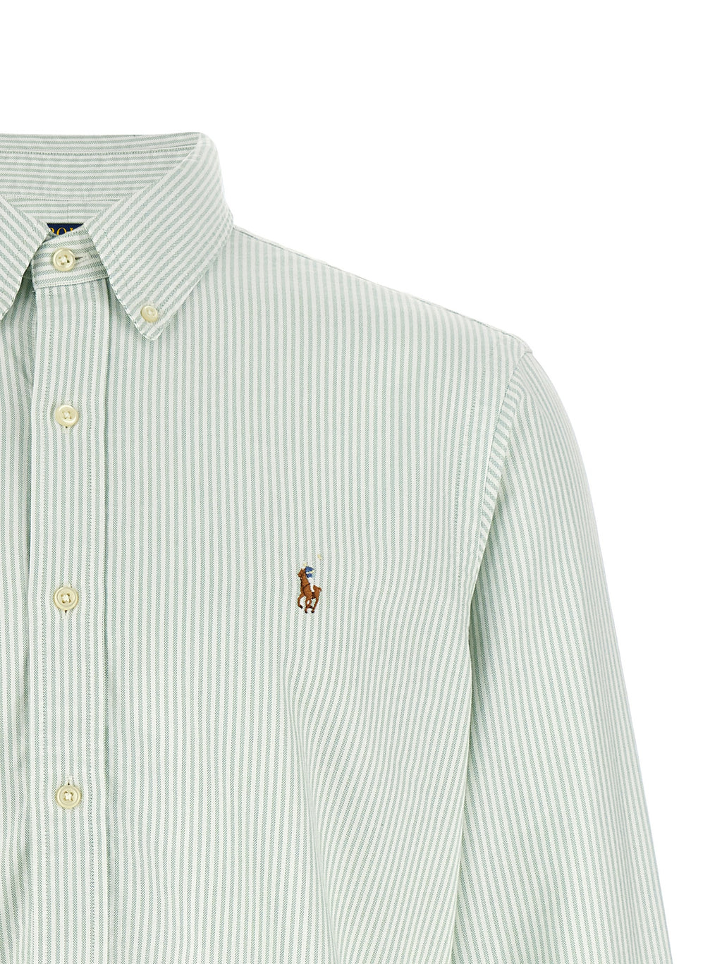 Blouse en coton bicolore Polo Ralph Lauren avec col et manches longues, portée élégante et décontractée.