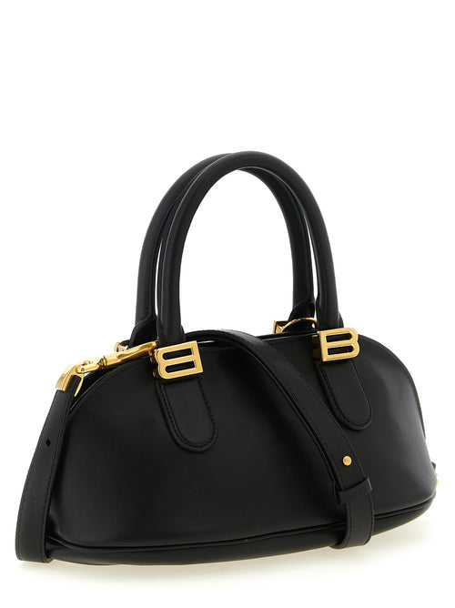 Sac à main Balenciaga en cuir de veau noir, élégant et sophistiqué, avec détails modernes et finition de haute qualité.