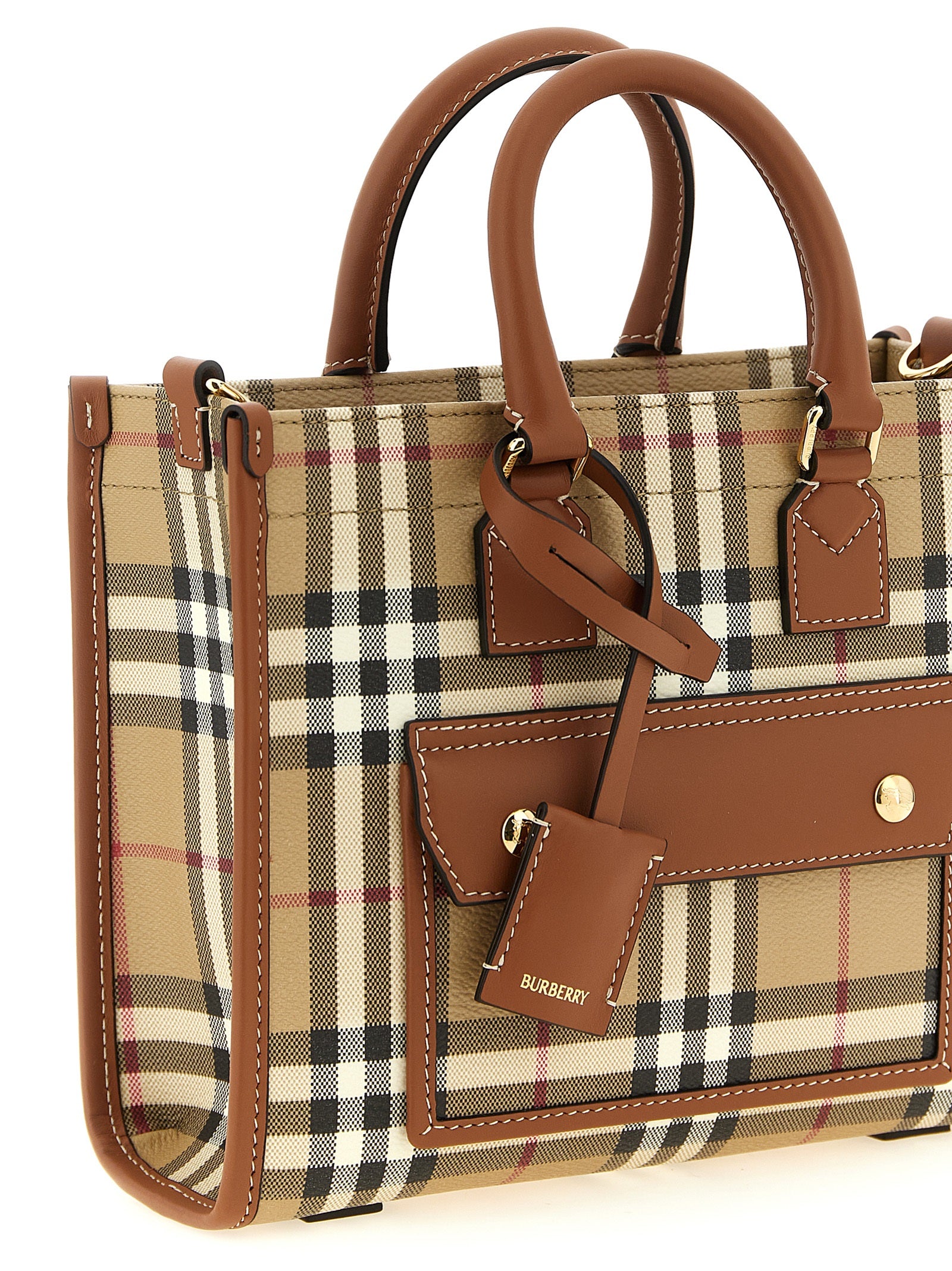 Sac cabas en polyéthylène beige de la marque Burberry, vue de face avec poignées visibles.