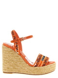 Sandales compensées en coton orange de Dolce & Gabbana, avec design élégant et confortable, visibles en gros plan sur l'image.