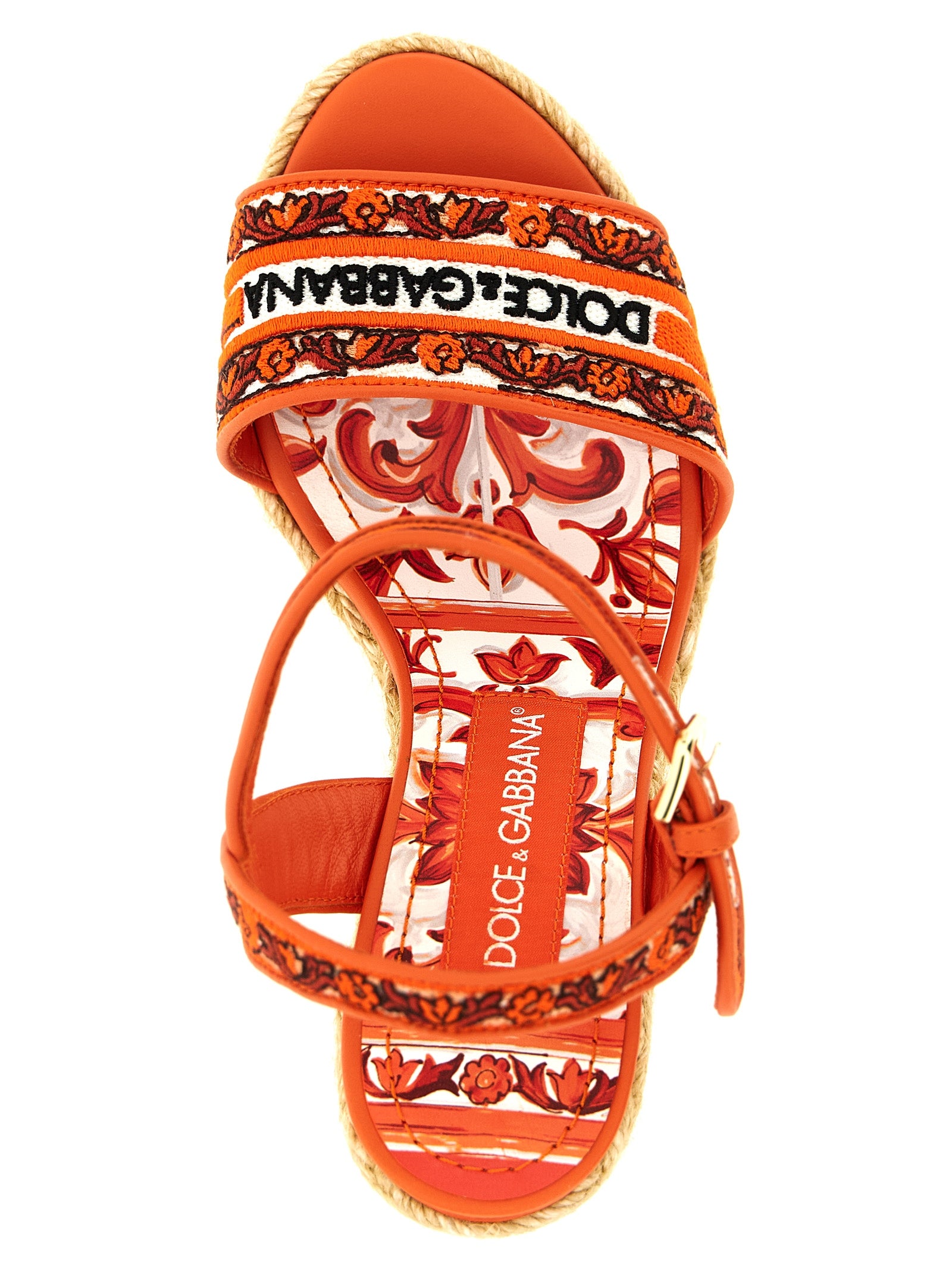 Sandales compensées en coton orange de Dolce & Gabbana, avec design élégant et semelle en liège.