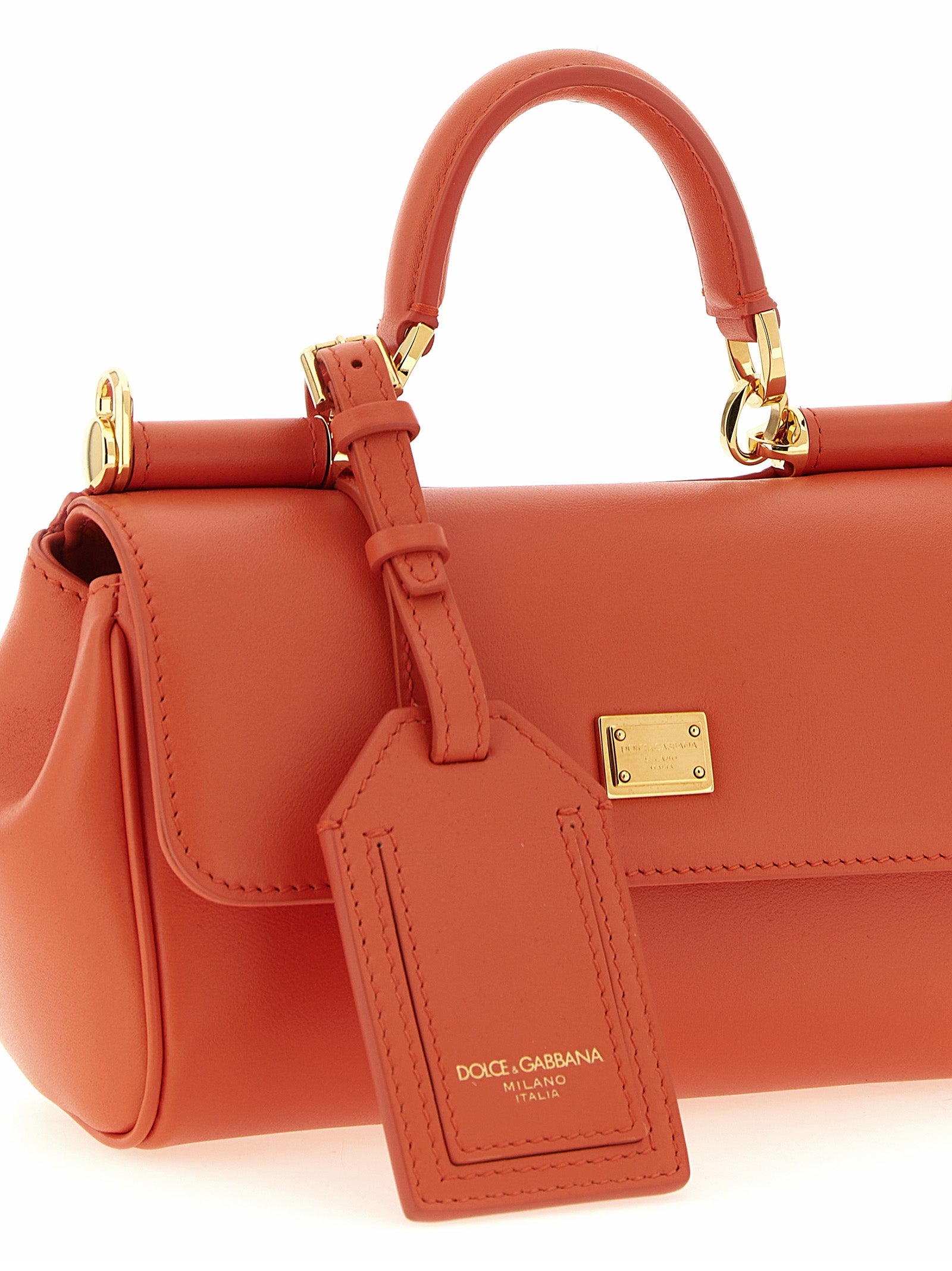 Sac à main en cuir de veau orange Dolce & Gabbana, design élégant avec détails sophistiqués et poignées en cuir.