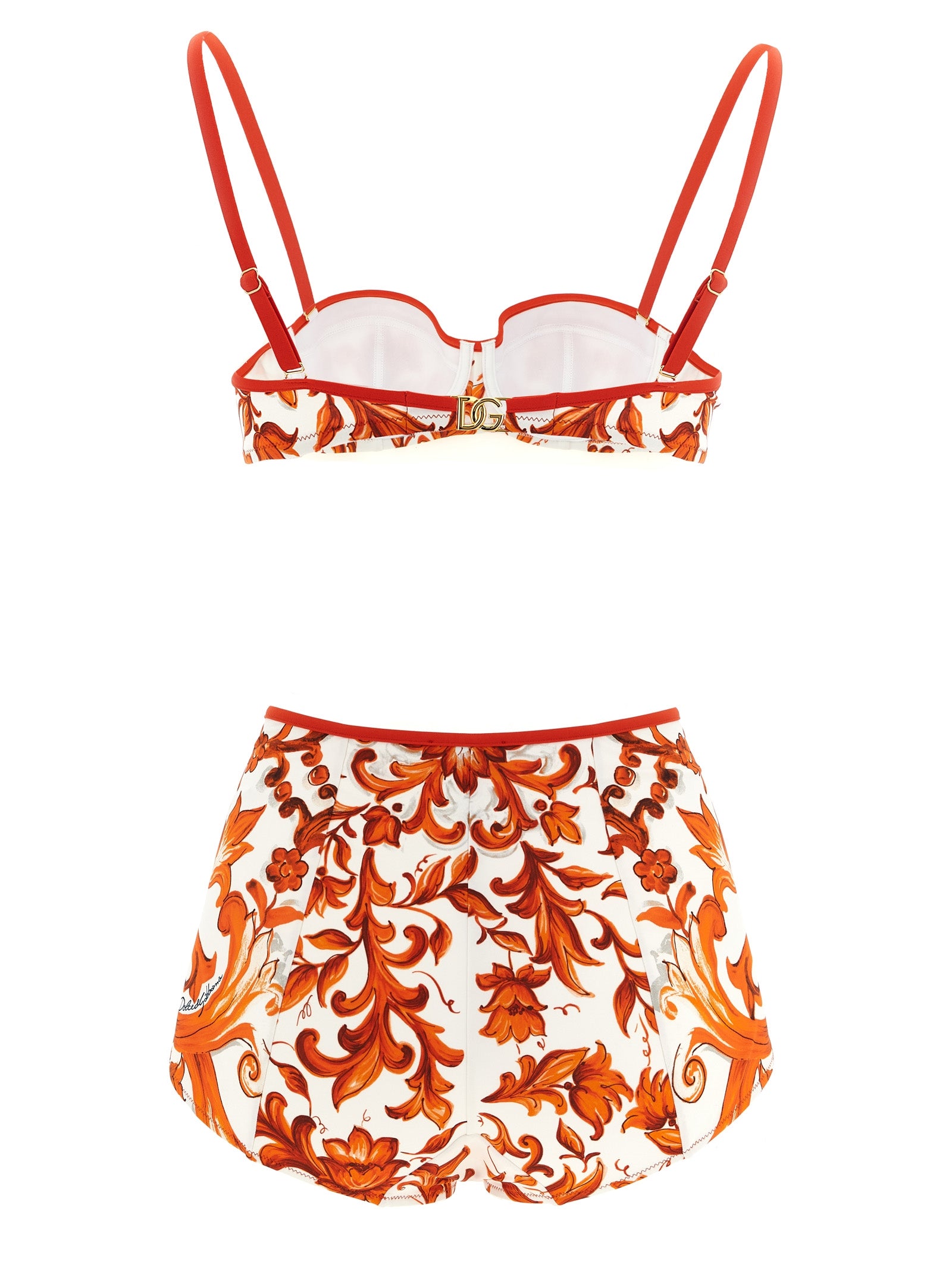 Bikini en polyamide orange de Dolce & Gabbana avec design élégant et détails modernes, porté sur la plage.
