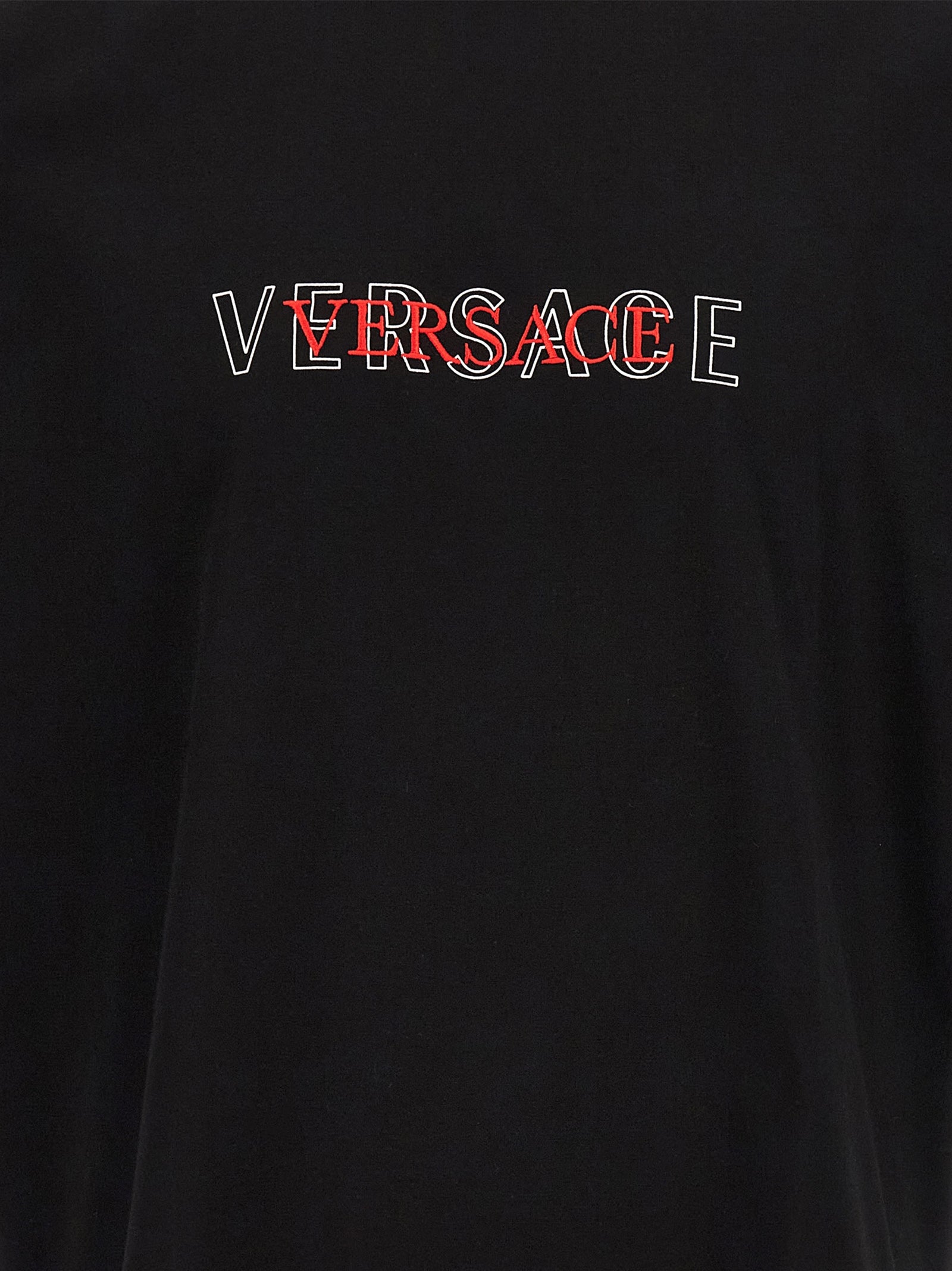 T-shirt noire en coton de la marque Versace, look élégant et moderne avec logo distinctif visible.