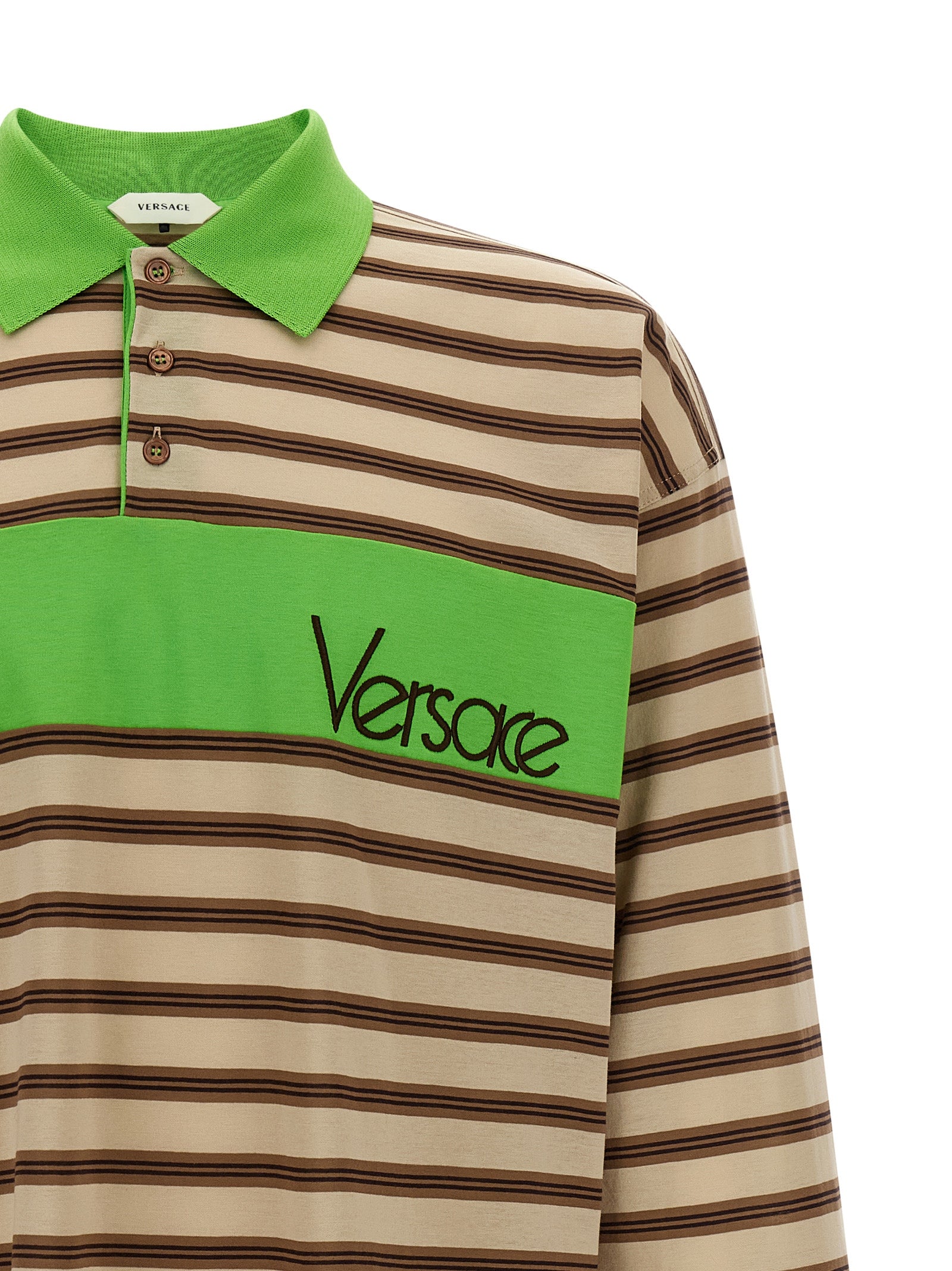 Chemise polo en coton multicolore de Versace, vue de face avec logo et détails colorés, pour un style élégant et décontracté.