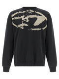 Sweat-shirt en coton noir Diesel, style décontracté, avec logo Diesel visible, porté dans un cadre décontracté.