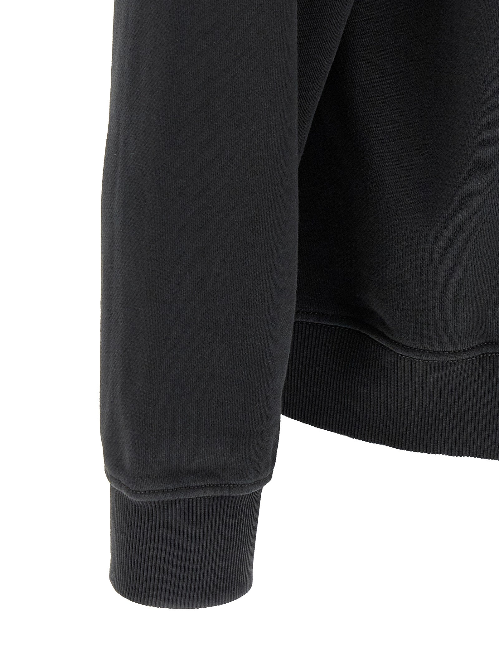 Sweat-shirt en coton noir Diesel Black, coupe décontractée, avec logo Diesel sur la poitrine, porté sur un mannequin.
