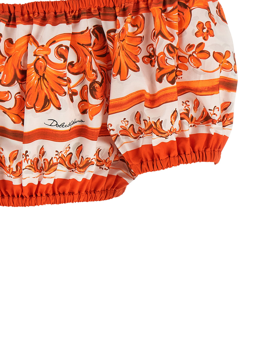 Chemisier en coton orange de Dolce & Gabbana, coupe élégante et détails raffinés, parfait pour un look sophistiqué.