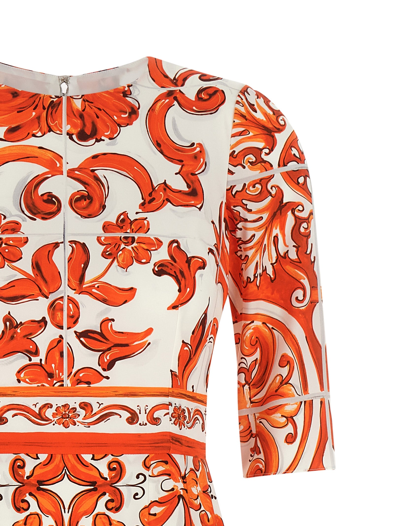 Robe midi en soie orange Dolce & Gabbana, élégante, fluide, avec détails sophistiqués visible sur l'image.