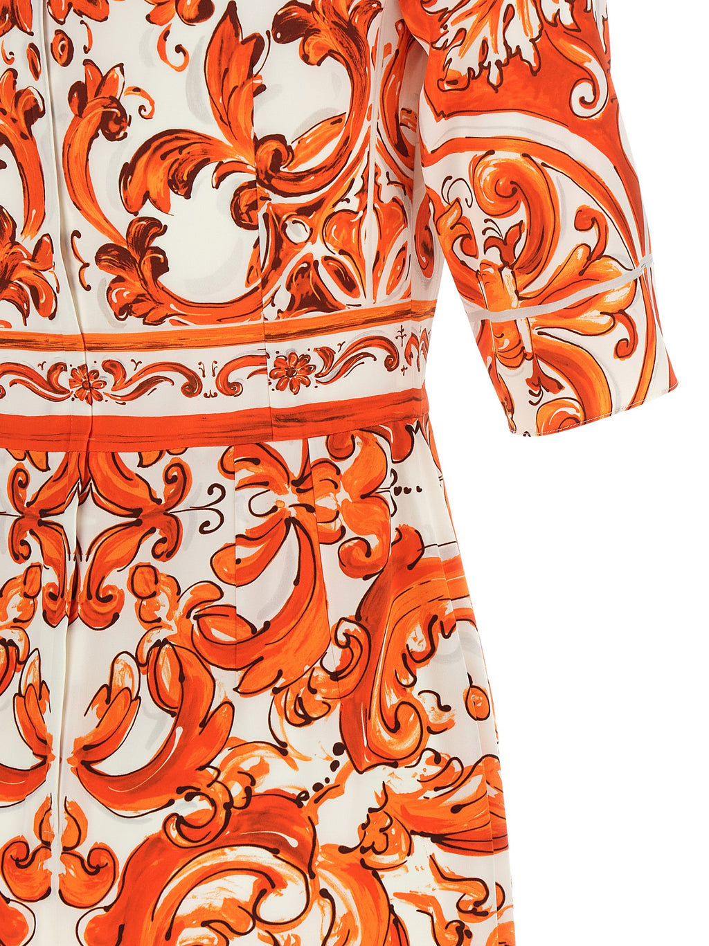 Robe midi en soie orange Dolce & Gabbana, élégante et fluide, avec décolleté et détails sophistiqués.