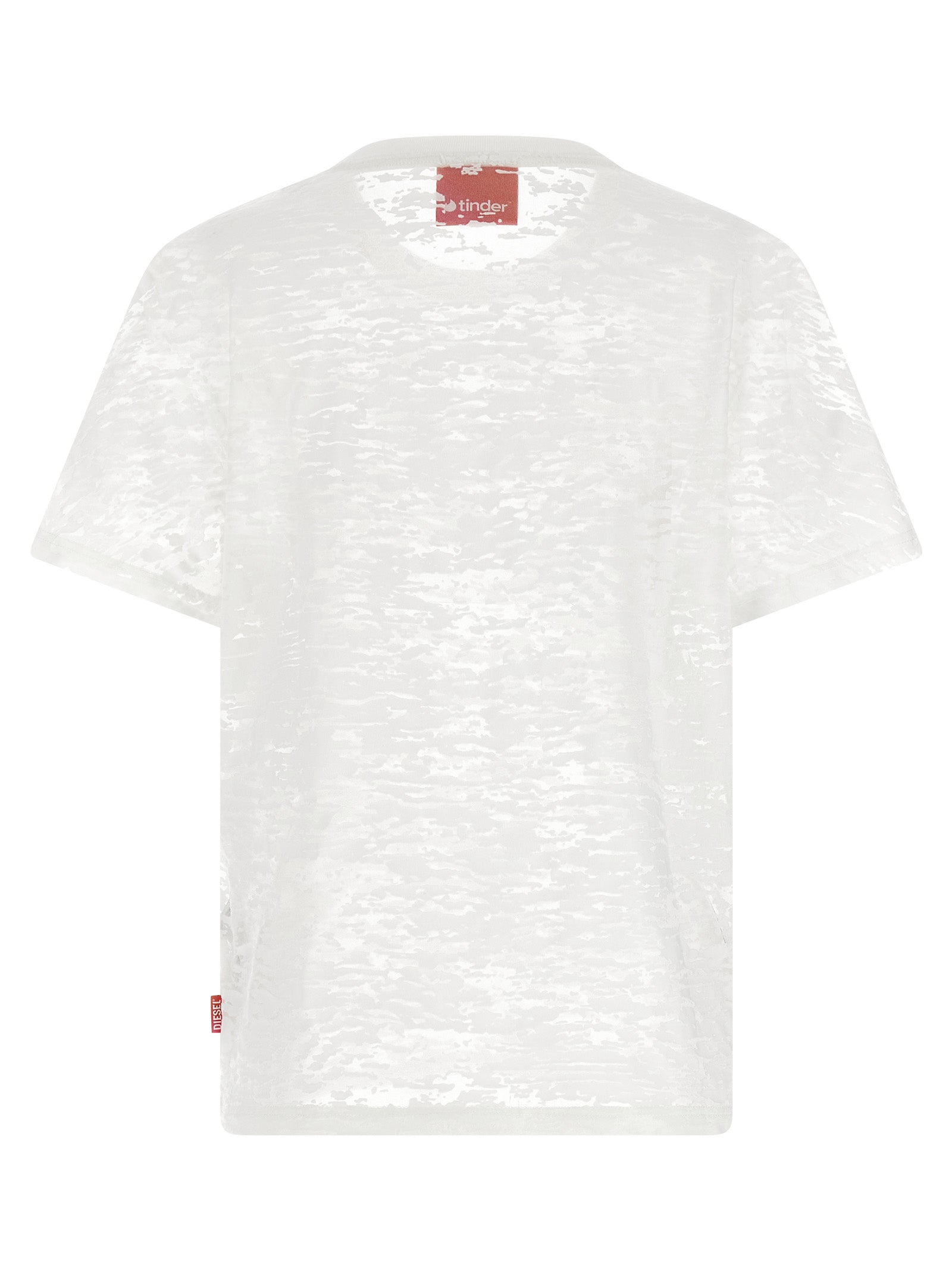 T-shirt en coton blanc Diesel pour homme, coupe classique, avec logo Diesel sur la poitrine, porté sur un mannequin.