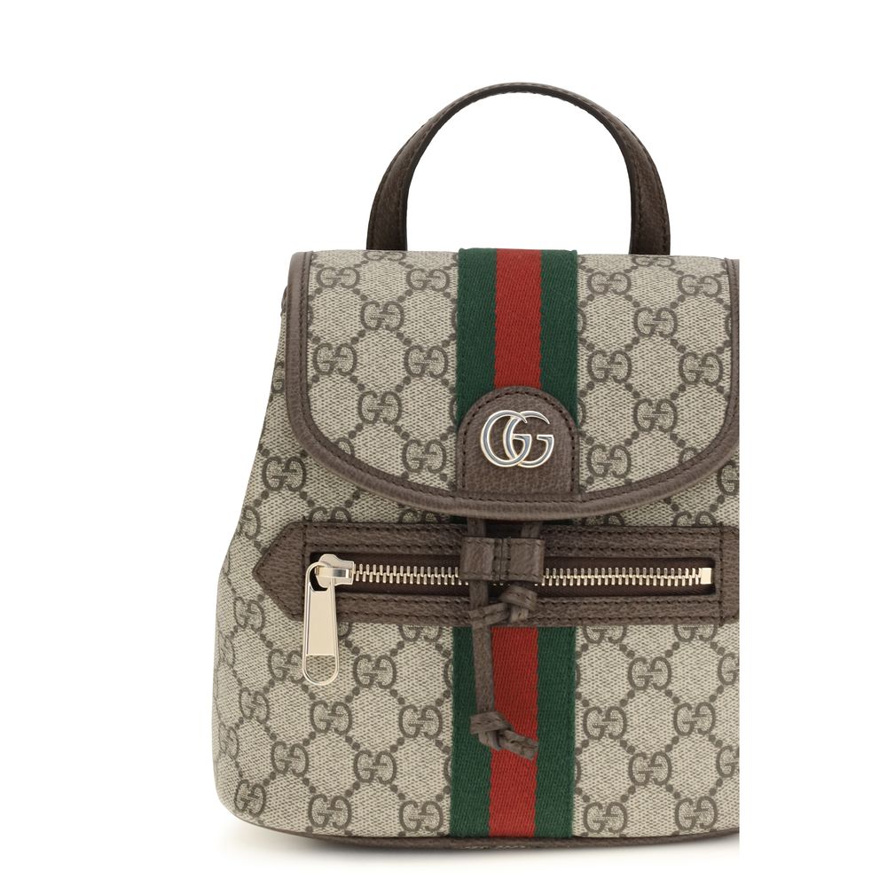 Sac à dos Gucci en tissu beige avec détails élégants, idéal pour un style sophistiqué et pratique.