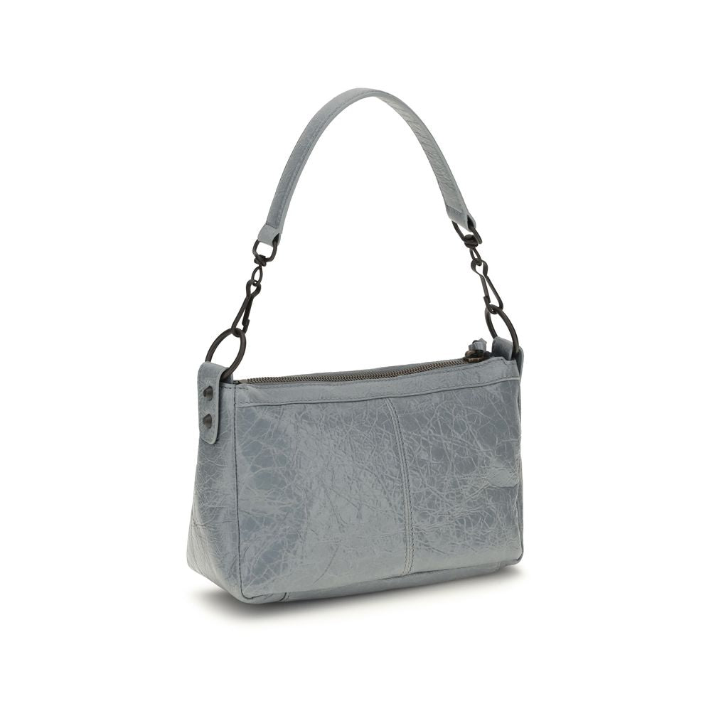 Sac à main Balenciaga en cuir d'agneau gris, élégant et sophistiqué, avec détails modernes et finition de haute qualité.