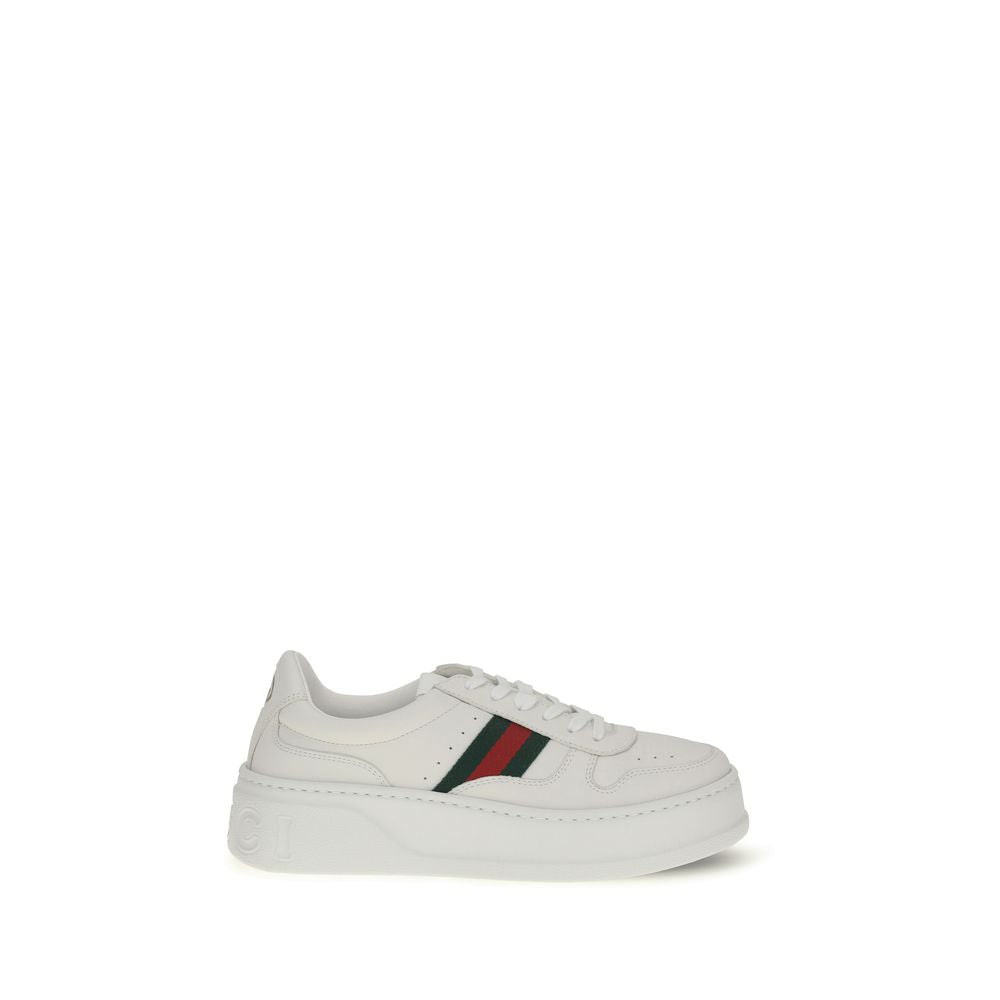 Chaussures Gucci Bos Taurus blanches en cuir de veau avec semelle chunky, style sneakers modernes et élégants.