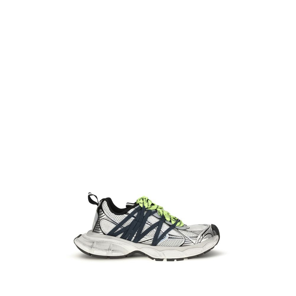 Sneakers athlétiques gris en polyester de Balenciaga, vue de face, avec semelle blanche et design moderne.