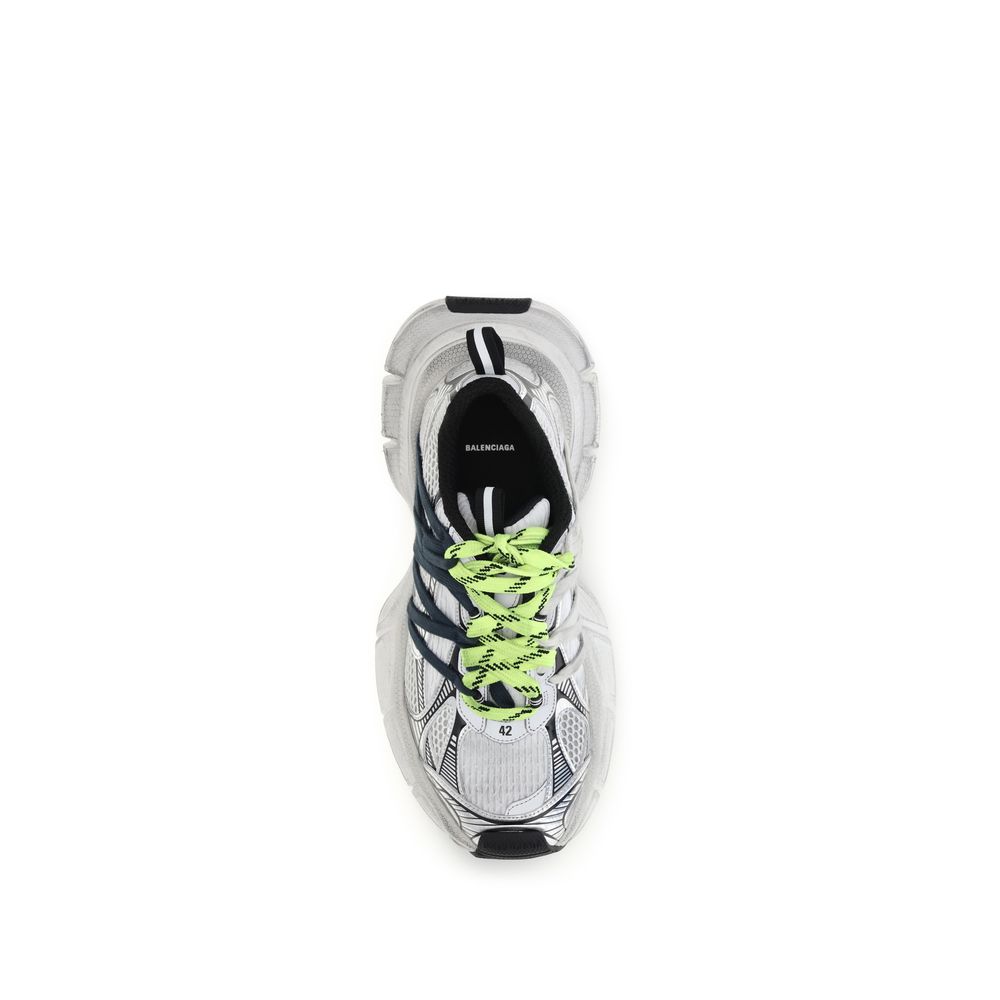 Chaussures de sport grises Balenciaga en polyester avec semelle blanche, visibles sur un fond neutre.