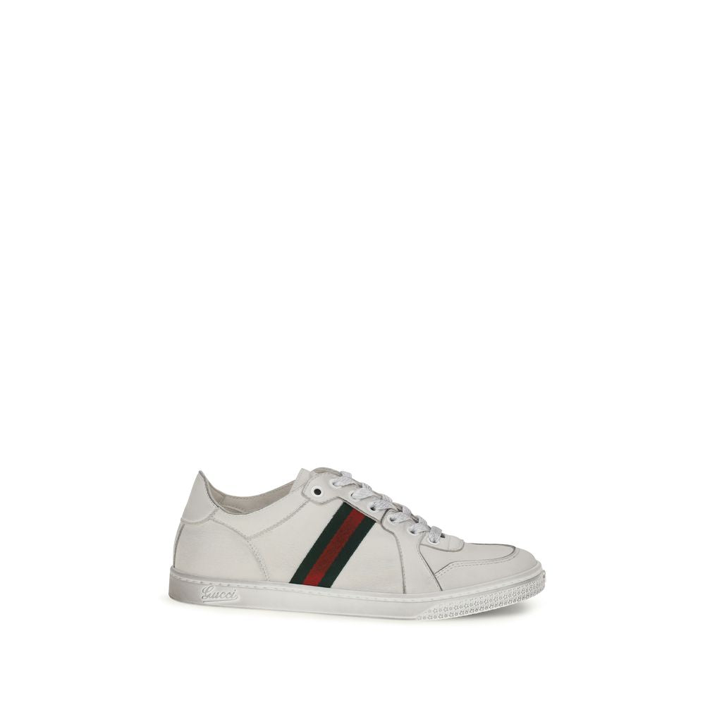 Chaussures de sport Gucci Bos Taurus en cuir blanc pour homme, avec design athlétique et détails élégants.