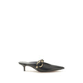 Mules Balenciaga en cuir de veau noir Bos Taurus, élégantes et sophistiquées, vues de côté sur fond neutre.