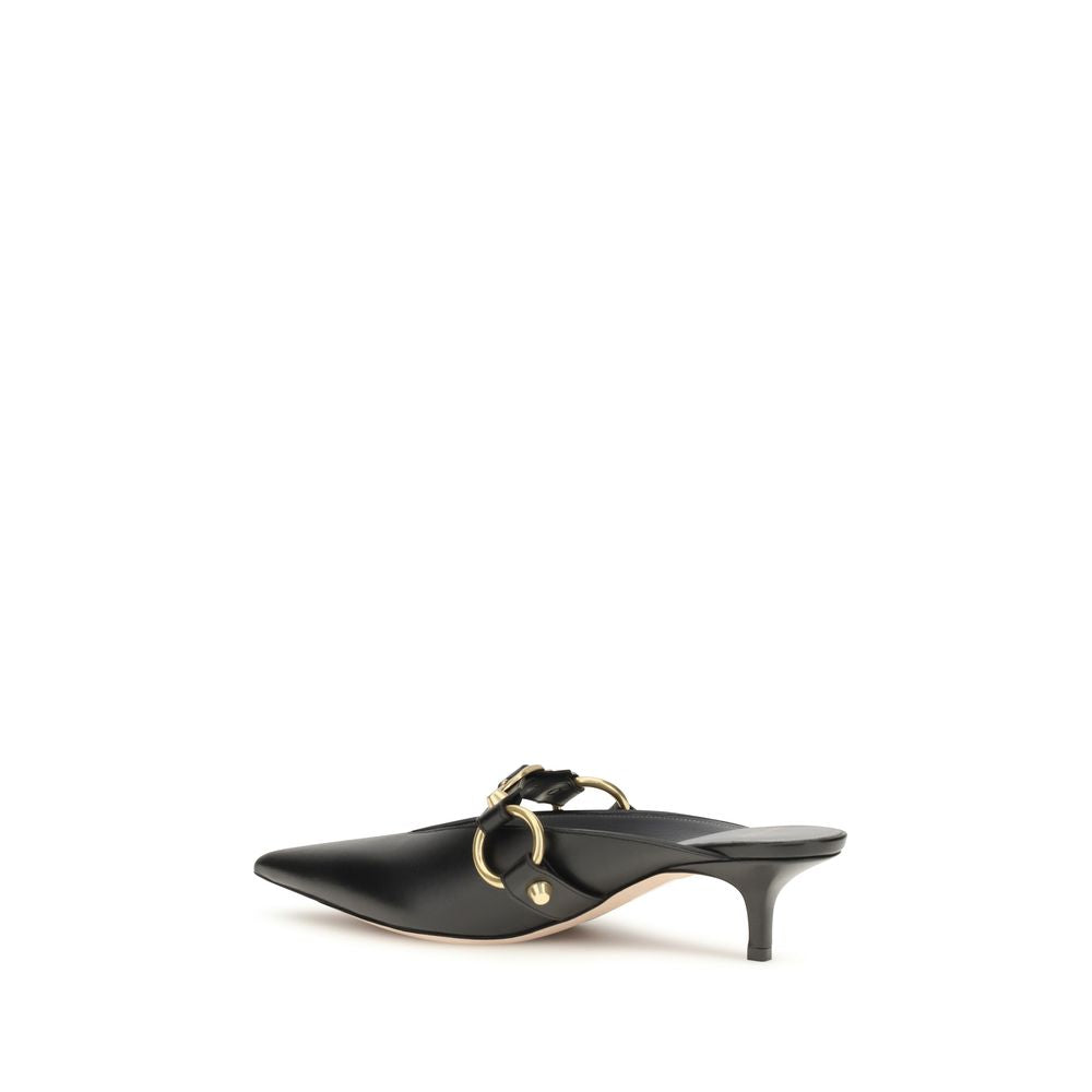 Mules Balenciaga en cuir de veau noir Bos Taurus, élégantes et modernes, vues de côté sur fond neutre.