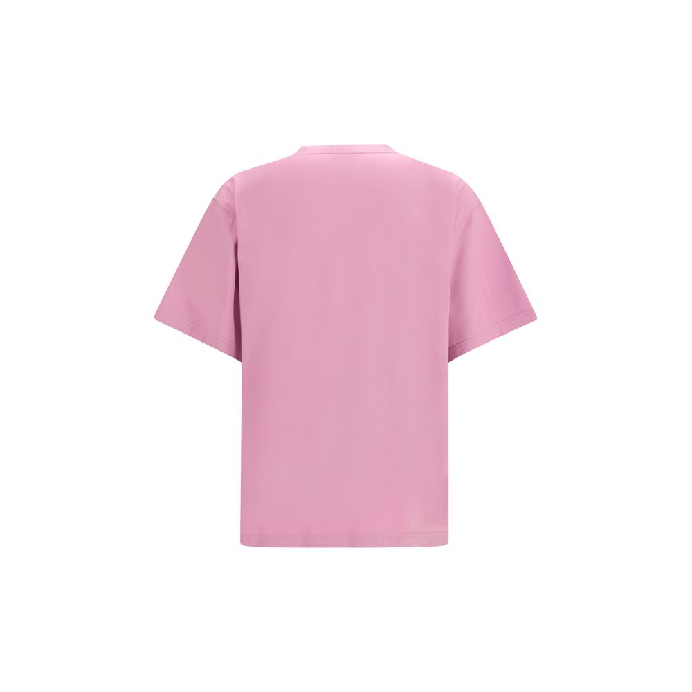 T-shirt en coton violet de Balenciaga affichant un design moderne et logo de la marque, porté sur un mannequin.