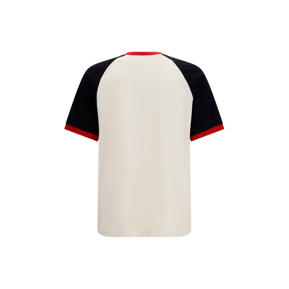 T-shirt blanc en coton de la marque Versace, coupe classique avec logo élégant sur le devant.