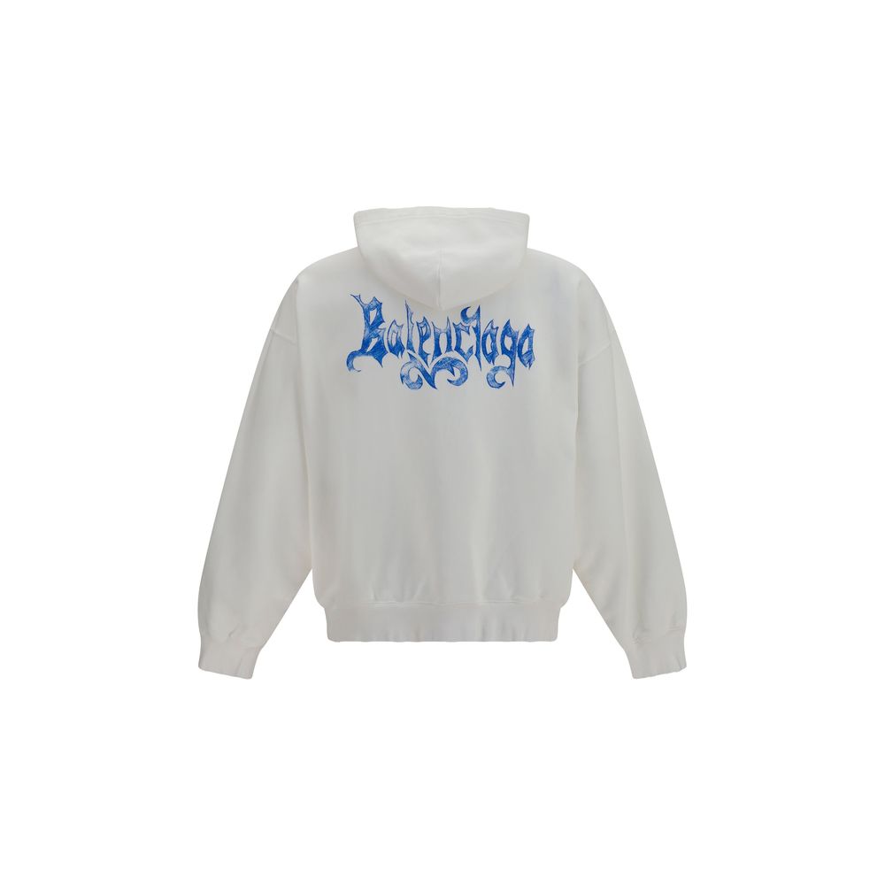 Sweat-shirt blanc en coton de la marque Balenciaga, doux et confortable, porté sur un modèle.