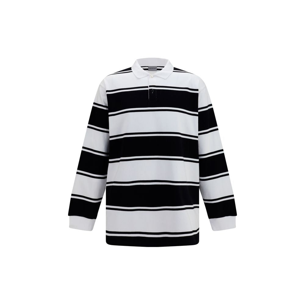 Chemise polo blanche en coton de la marque Balenciaga, avec col classique et logo discret visible sur l'image.