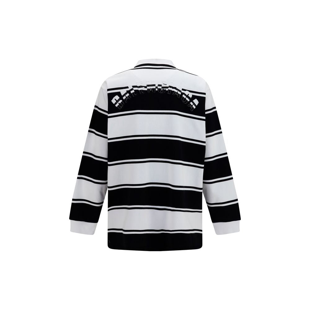 Chemise polo blanche en coton de Balenciaga, vue de face, avec col et boutons, sur fond neutre.