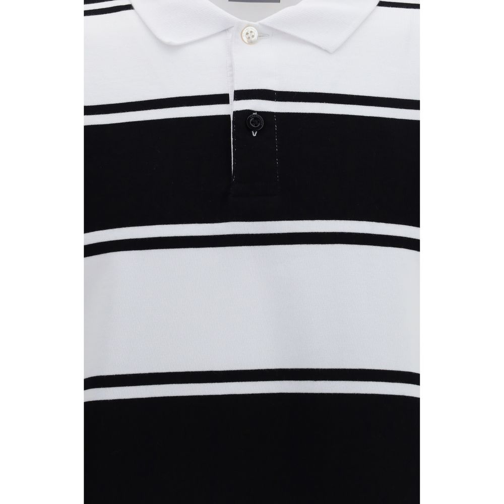 Chemise polo blanche en coton de la marque Balenciaga, avec col et boutons, visible sur l'image.