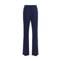 Pantalon en laine bleue Balenciaga Oves Aries, coupe décontractée, détails modernes, porté sur mannequin.