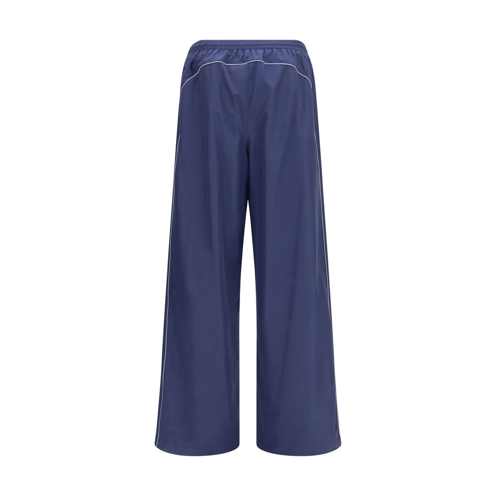 Pantalons athlétics en coton bleu de Balenciaga, style décontracté avec ceinture élastique et poches latérales.