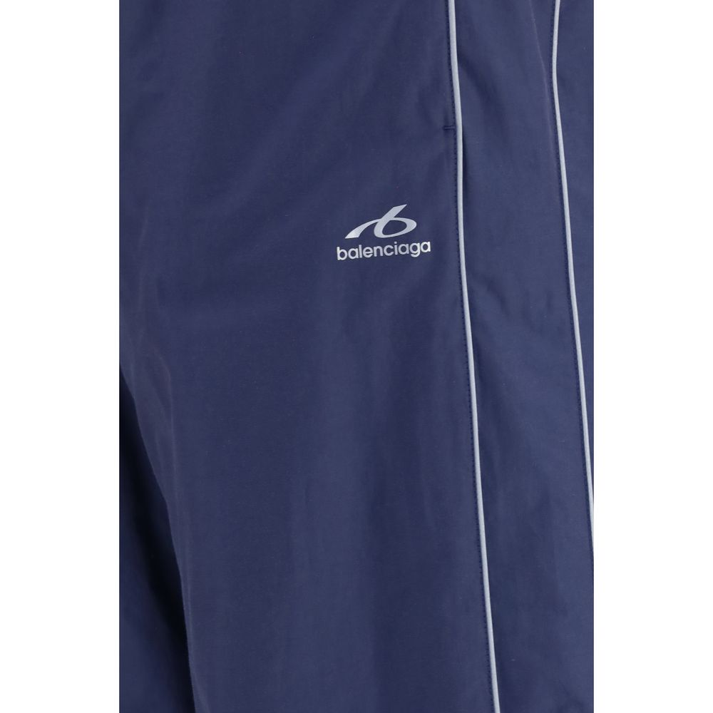Pantalon de sport en coton bleu Balenciaga, style athlétique, avec coupe décontractée et détails modernes.