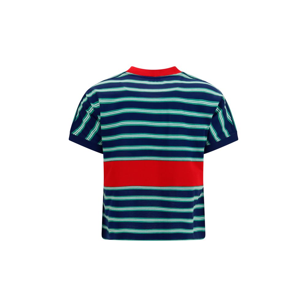 T-shirt en coton multicolore de la marque Versace, avec logo emblématique et design vibrant, porté sur un mannequin.