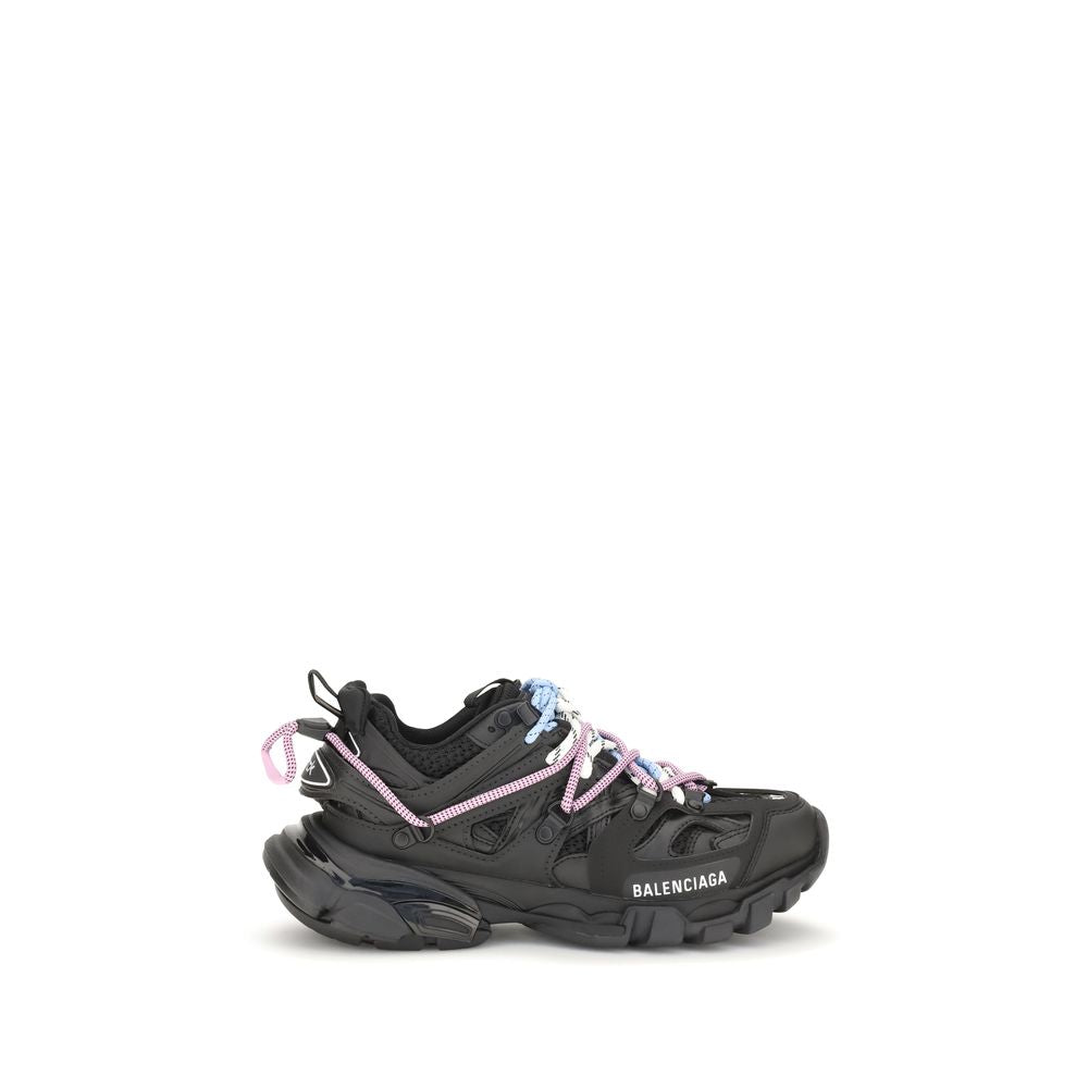 Sneakers athlétiques en polyester noir de la marque Balenciaga, vue de face avec détails modernes.