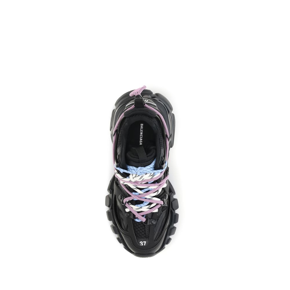 Chaussures de sport Balenciaga en polyester noir, baskets athlétiques modernes avec semelle blanche et design épuré.