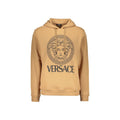 Sweatshirt en coton marron de la marque Versace, coupe décontractée avec logo distinctif sur la poitrine.