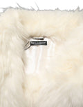 Manteau long à manches longues en fausse fourrure blanche de Dolce & Gabbana, élégant et chaud.