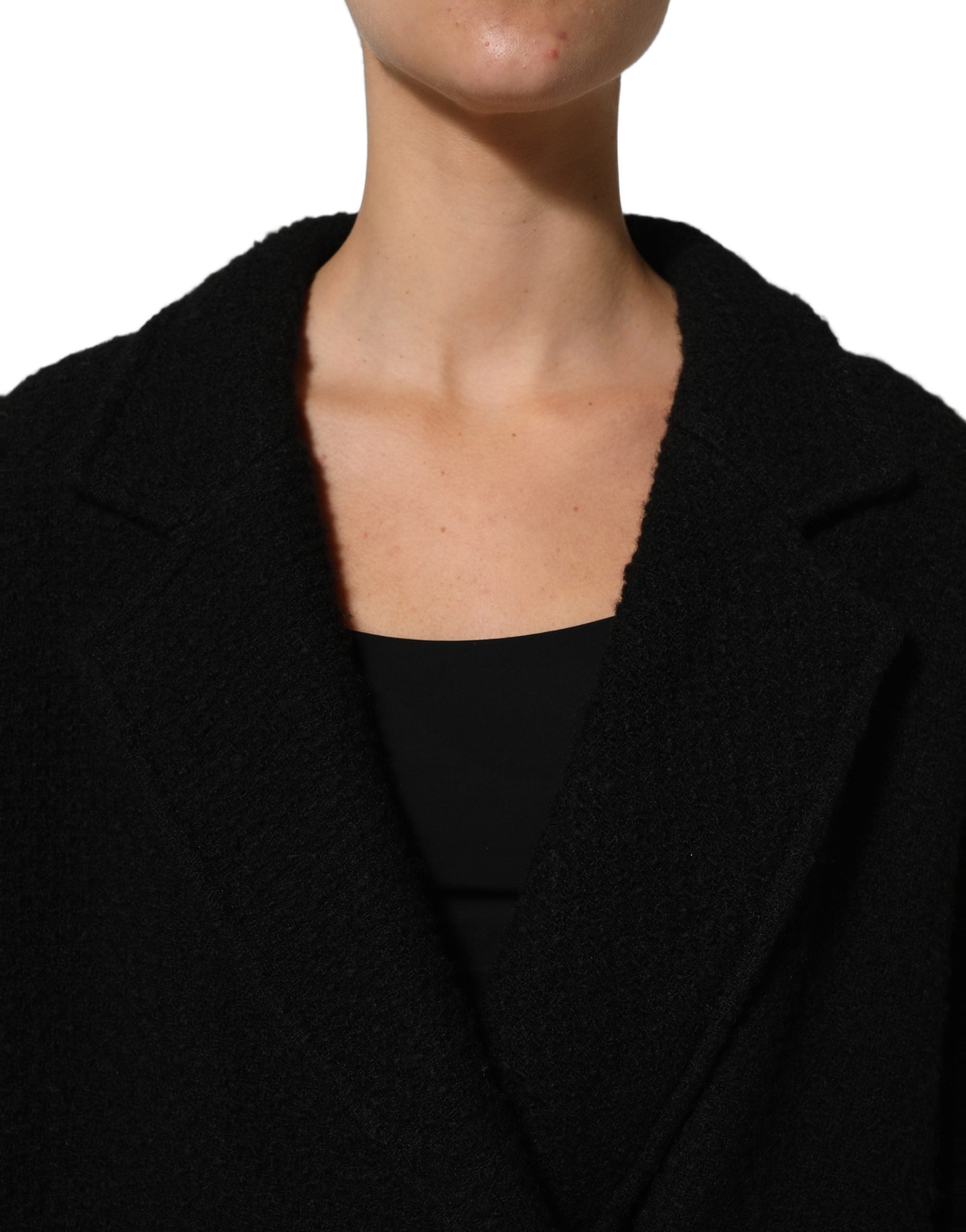 Manteau trench homme noir à double boutonnage Dolce & Gabbana, veste élégante avec col et détails sophistiqués.