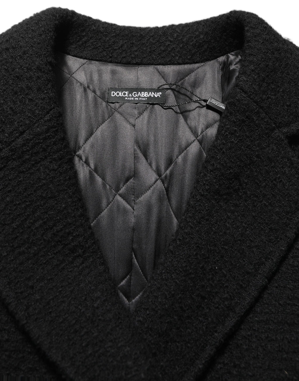 Manteau trench double boutonnage noir pour homme de la marque Dolce & Gabbana, vue de face.
