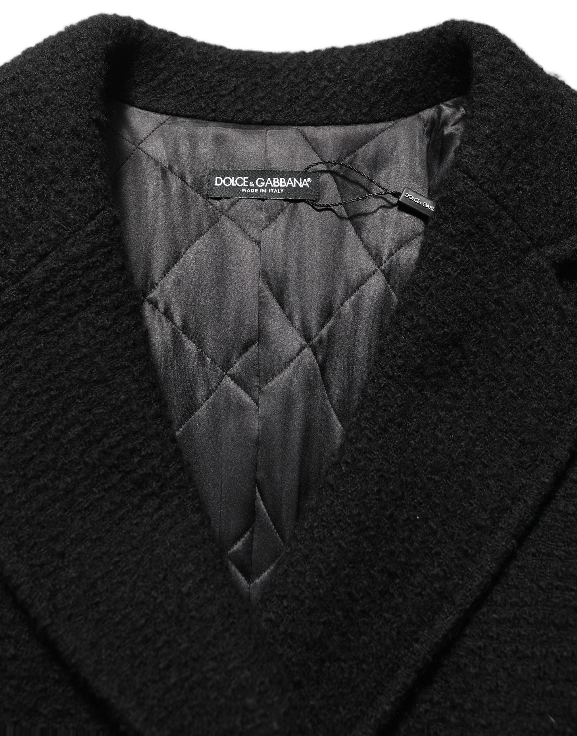 Manteau trench double boutonnage noir pour homme de la marque Dolce & Gabbana, vue de face.