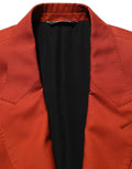 Veste blazer rouge en cachemire Dolce & Gabbana, coupe simple, col à revers, détails élégants, tissu doux et chaud.