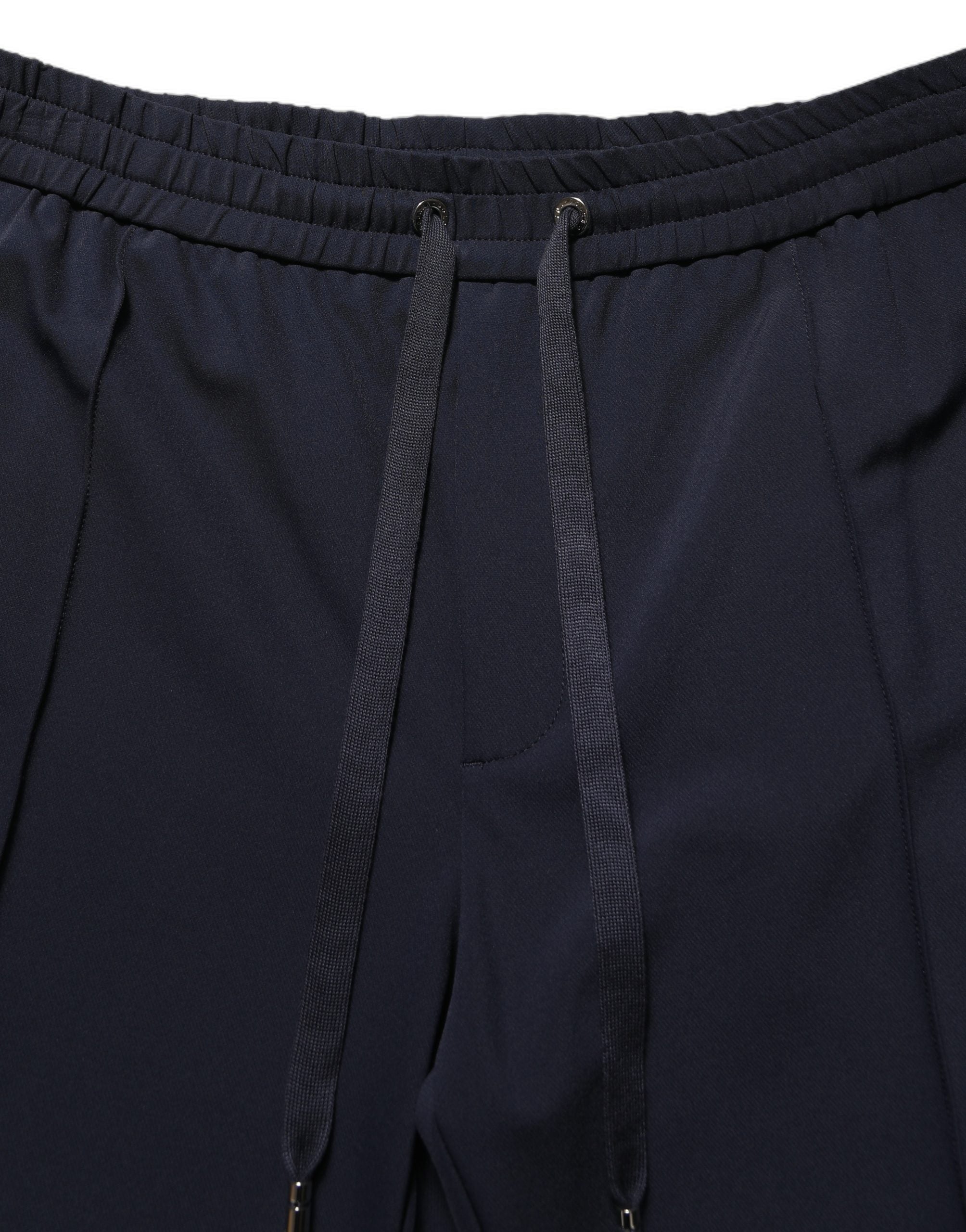 Pantalon de jogging en nylon bleu foncé Dolce & Gabbana avec cordon de serrage, style décontracté et confortable.