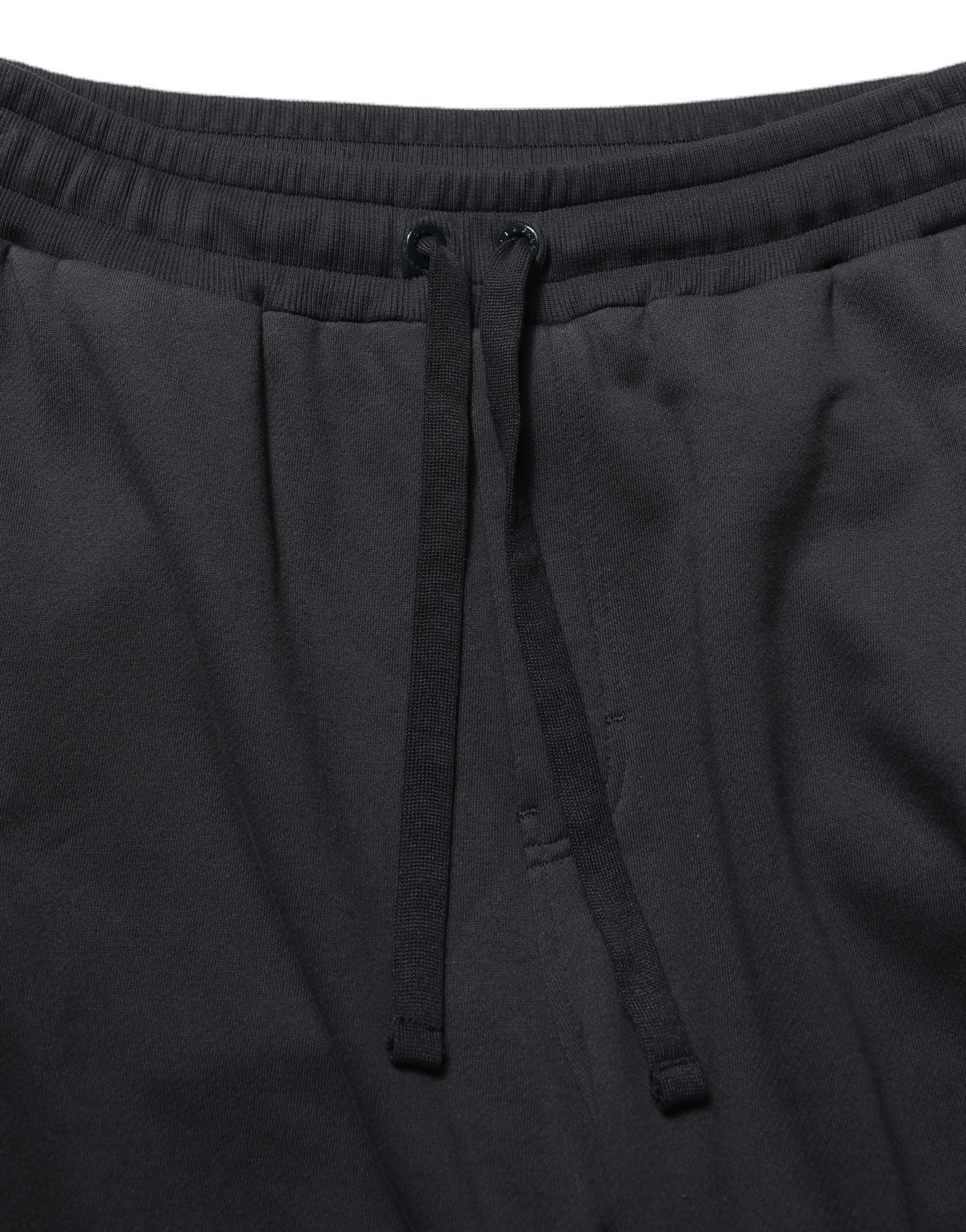 Pantalon de jogging noir Dolce & Gabbana pour homme, jogger en viscose avec cordon de serrage, style décontracté et élégant.