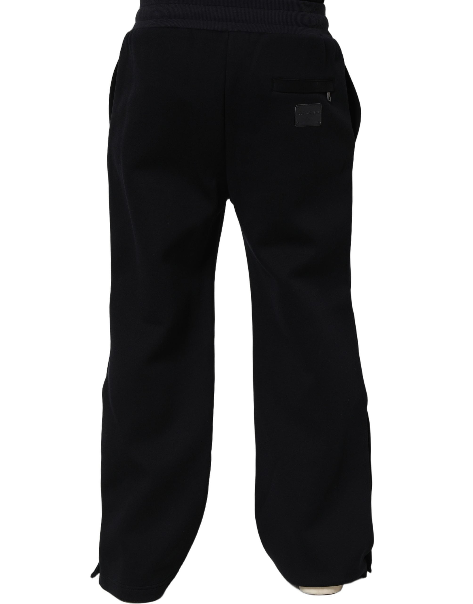 Pantalon de jogging noir Dolce & Gabbana pour homme avec cordon de serrage en viscose, style décontracté et confortable.