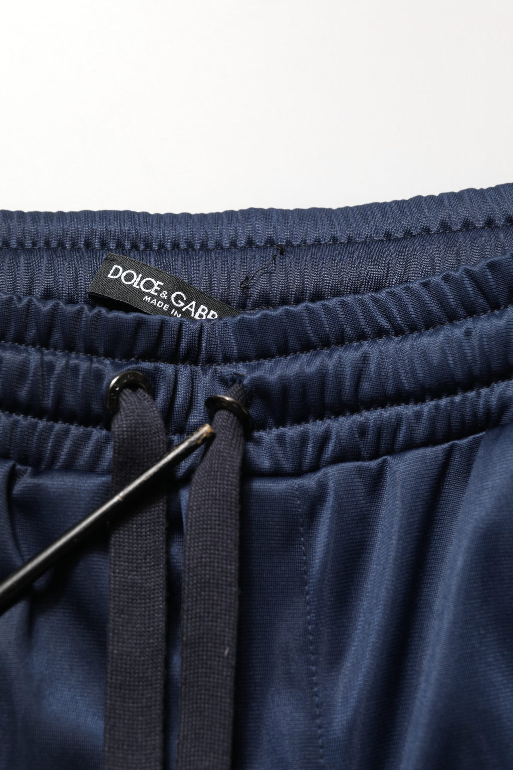 Pantalon de jogging Dolce & Gabbana bleu et blanc avec cordon de serrage, style décontracté et confortable.