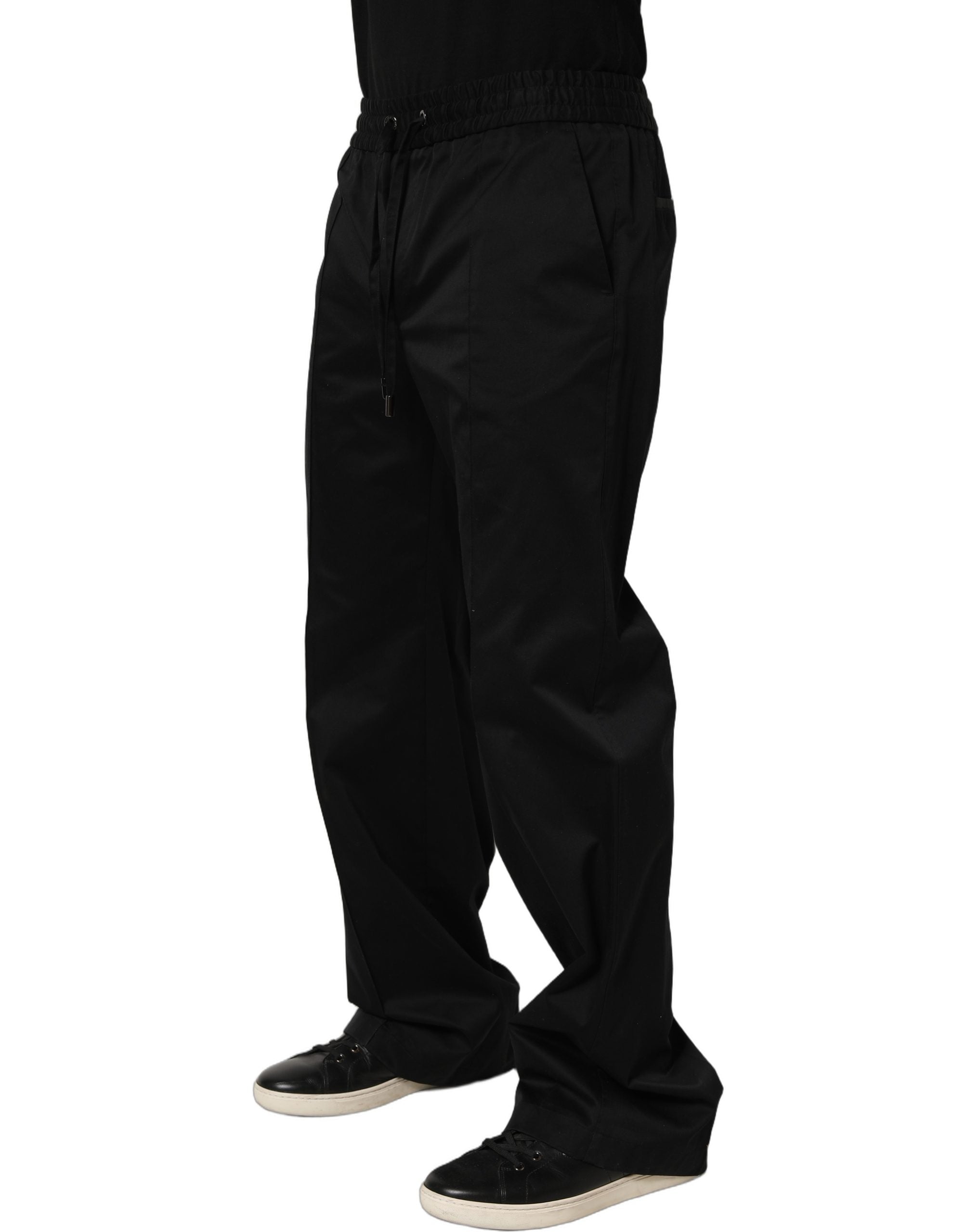 Pantalon jogging noir Dolce & Gabbana pour homme en coton à cordon de serrage, style décontracté et confortable.